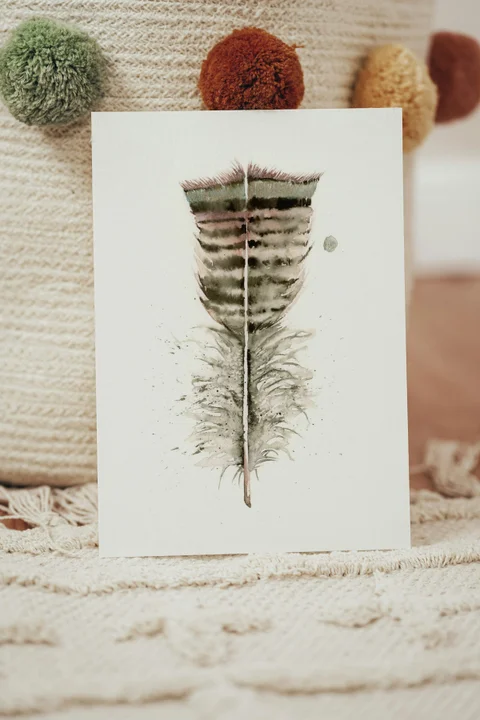 Image of a feather watercolor painting by Shayna Larsen, originals & prints available