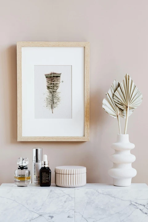 Image of a feather watercolor painting by Shayna Larsen, originals & prints available