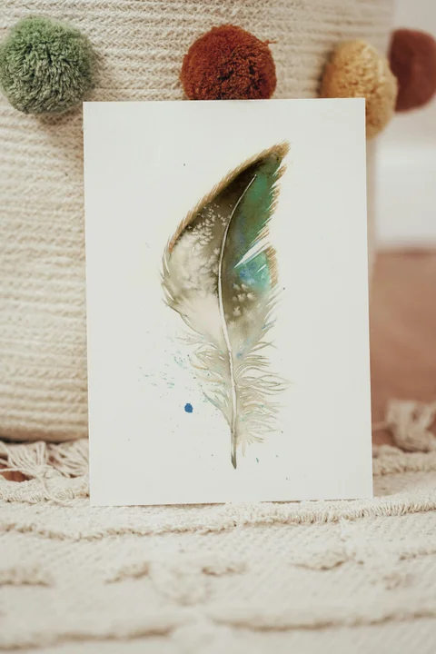 Image of a feather watercolor painting by Shayna Larsen, originals & prints available