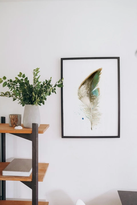 Image of a feather watercolor painting by Shayna Larsen, originals & prints available