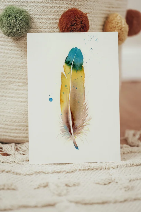 Image of a feather watercolor painting by Shayna Larsen, originals & prints available