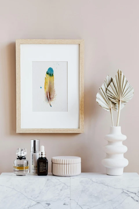 Image of a feather watercolor painting by Shayna Larsen, originals & prints available