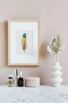 Image of a feather watercolor painting by Shayna Larsen, originals & prints available