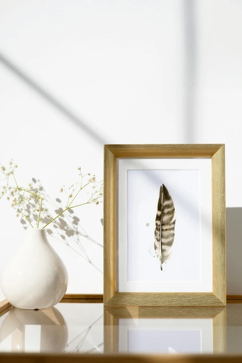 Image of a feather watercolor painting by Shayna Larsen, originals & prints available