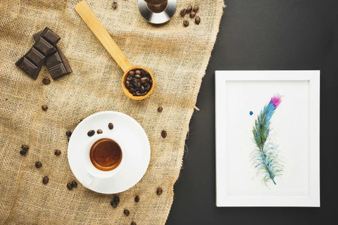 Image of a feather watercolor painting by Shayna Larsen, originals & prints available