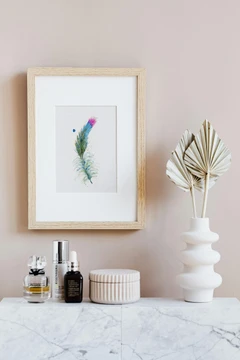 Image of a feather watercolor painting by Shayna Larsen, originals & prints available