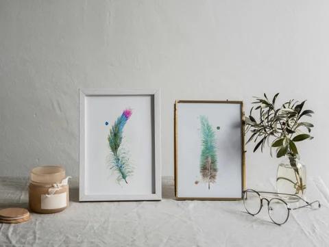Image of a feather watercolor painting by Shayna Larsen, originals & prints available