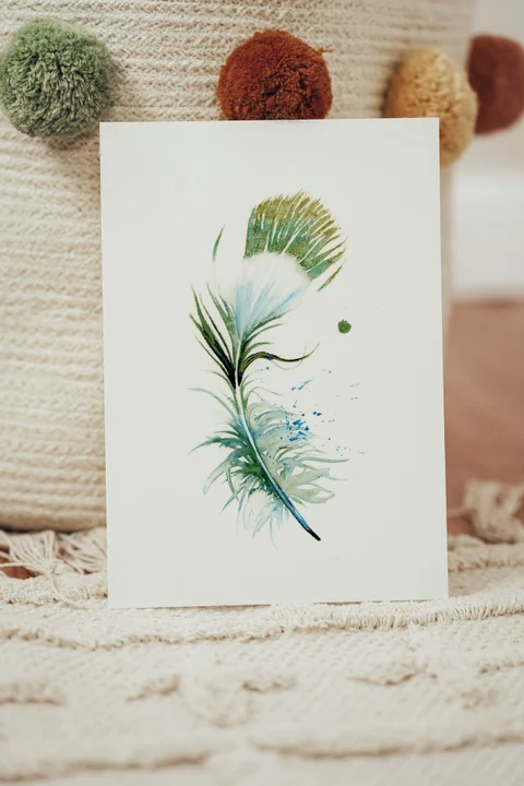 Image of a feather watercolor painting by Shayna Larsen, originals & prints available