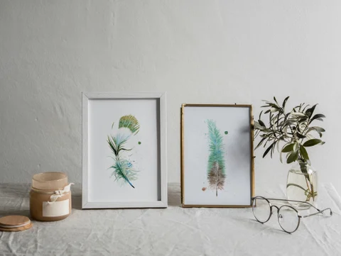 Image of a feather watercolor painting by Shayna Larsen, originals & prints available