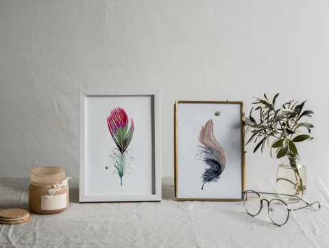 Image of a feather watercolor painting by Shayna Larsen, originals & prints available