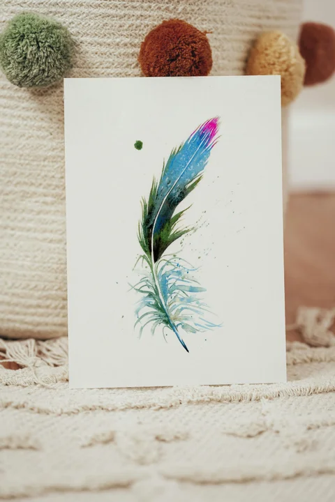 Image of a feather watercolor painting by Shayna Larsen, originals & prints available