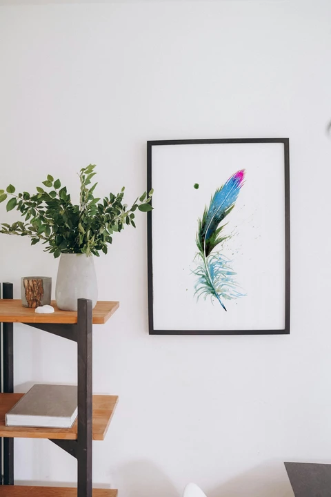 Image of a feather watercolor painting by Shayna Larsen, originals & prints available
