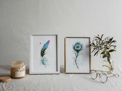 Image of a feather watercolor painting by Shayna Larsen, originals & prints available