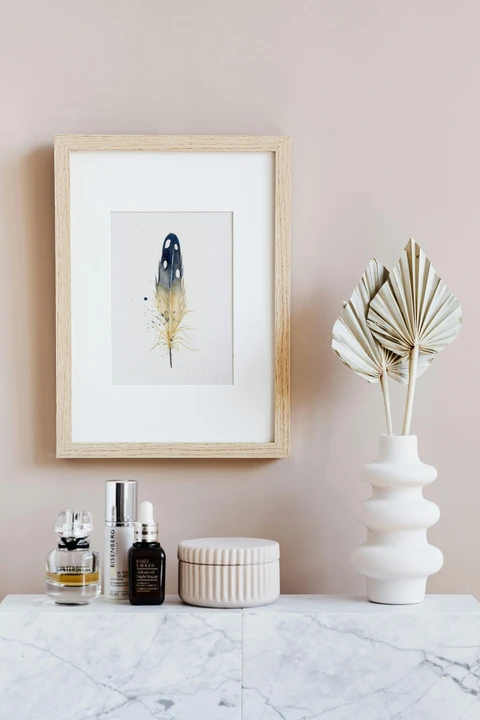 Image of a feather watercolor painting by Shayna Larsen, originals & prints available