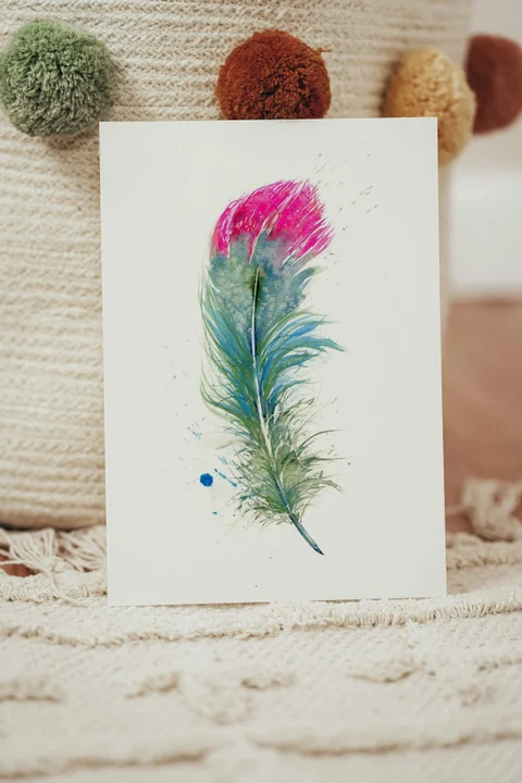Image of a feather watercolor painting by Shayna Larsen, originals & prints available
