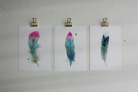 Image of a feather watercolor painting by Shayna Larsen, originals & prints available