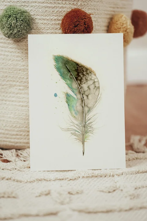 Image of a feather watercolor painting by Shayna Larsen, originals & prints available