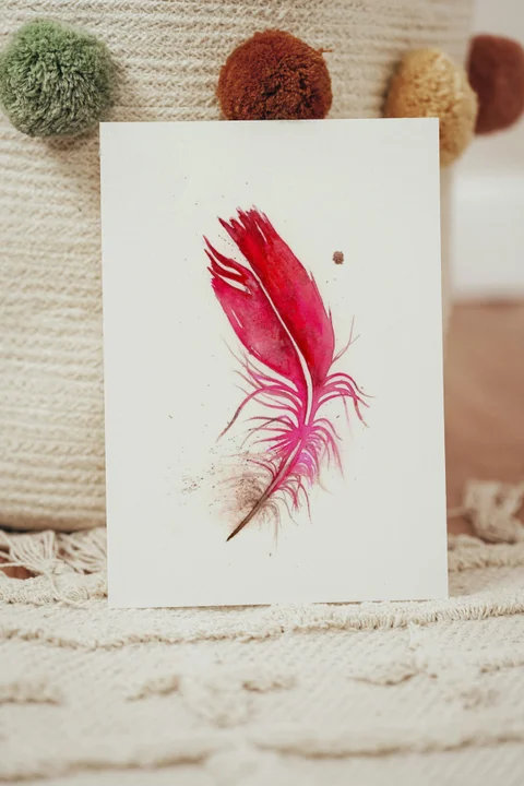Image of a feather watercolor painting by Shayna Larsen, originals & prints available