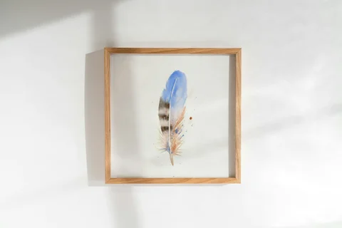 Image of a feather watercolor painting by Shayna Larsen, originals & prints available