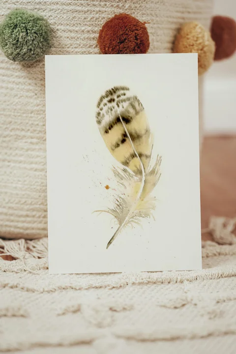 Image of a feather watercolor painting by Shayna Larsen, originals & prints available