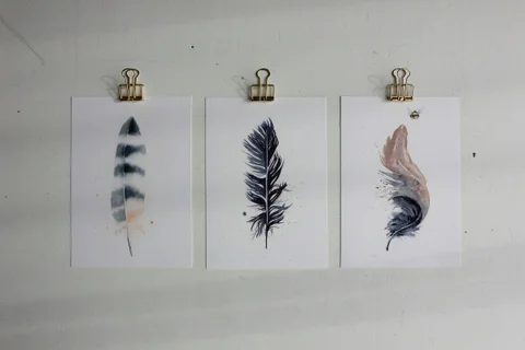 Image of a feather watercolor painting by Shayna Larsen, originals & prints available