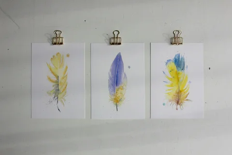 Image of a feather watercolor painting by Shayna Larsen, originals & prints available