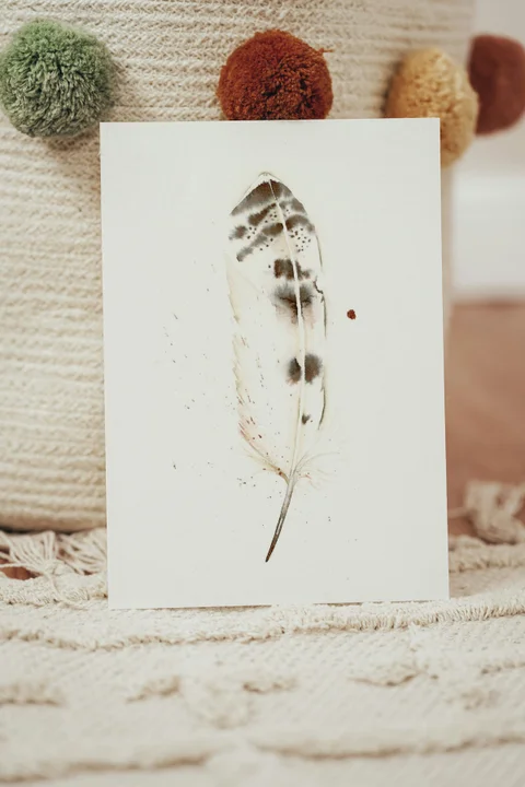 Image of a feather watercolor painting by Shayna Larsen, originals & prints available