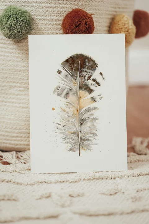 Image of a feather watercolor painting by Shayna Larsen, originals & prints available