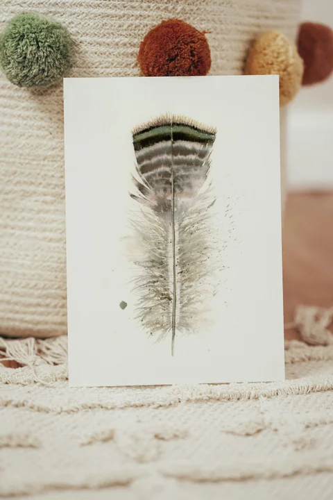 Image of a feather watercolor painting by Shayna Larsen, originals & prints available