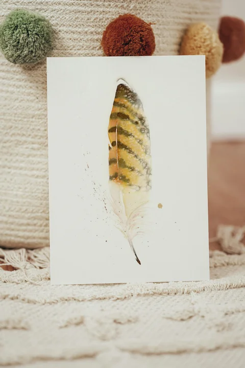 Image of a feather watercolor painting by Shayna Larsen, originals & prints available