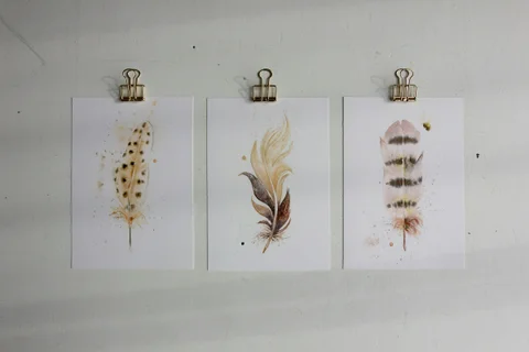 Image of a feather watercolor painting by Shayna Larsen, originals & prints available